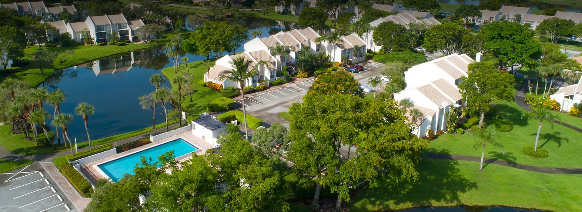Bridgewood in Boca West with a combination of villas, townhomes and mid rise units with golf course and water views