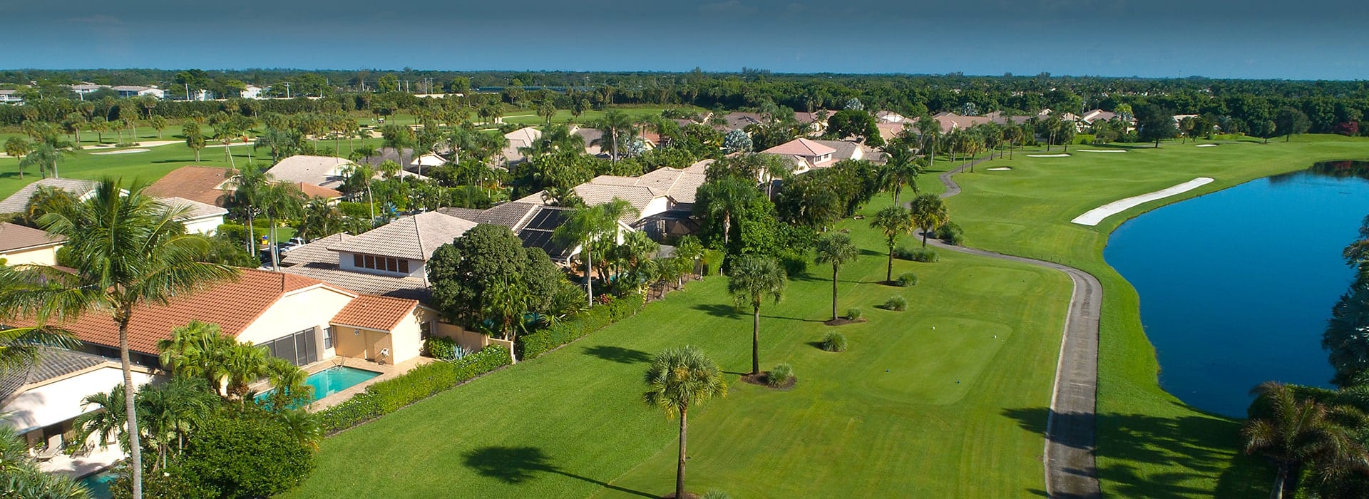 Cedar Glen single-family patio homes with views of Boca West golf course