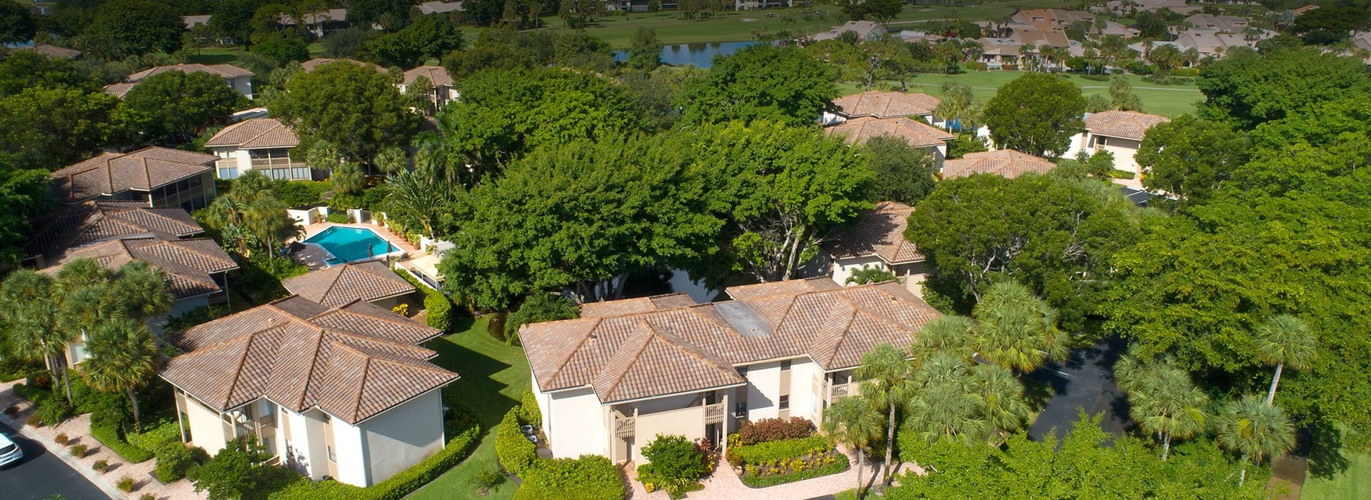 Quail Hollow, a community of townhomes in Boca West surrounded by mature trees