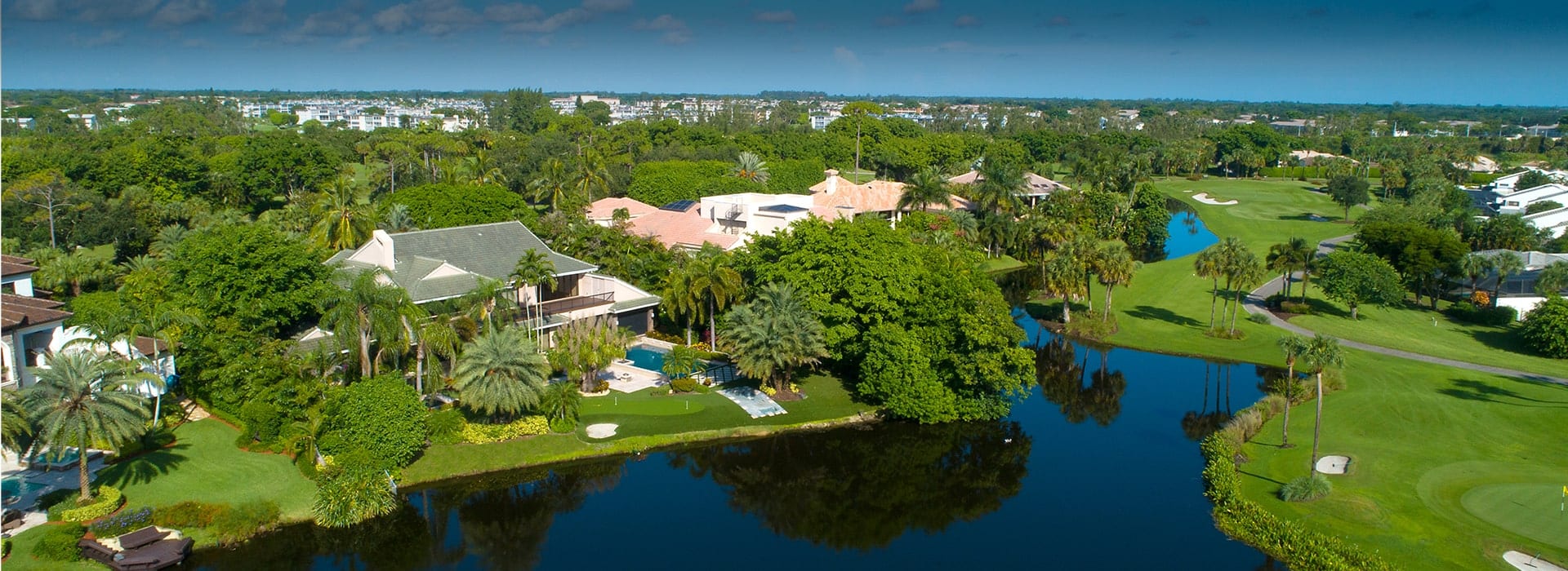 Boca West's The Island neighborhood of custom-built homes, each with a view of the golf course and water