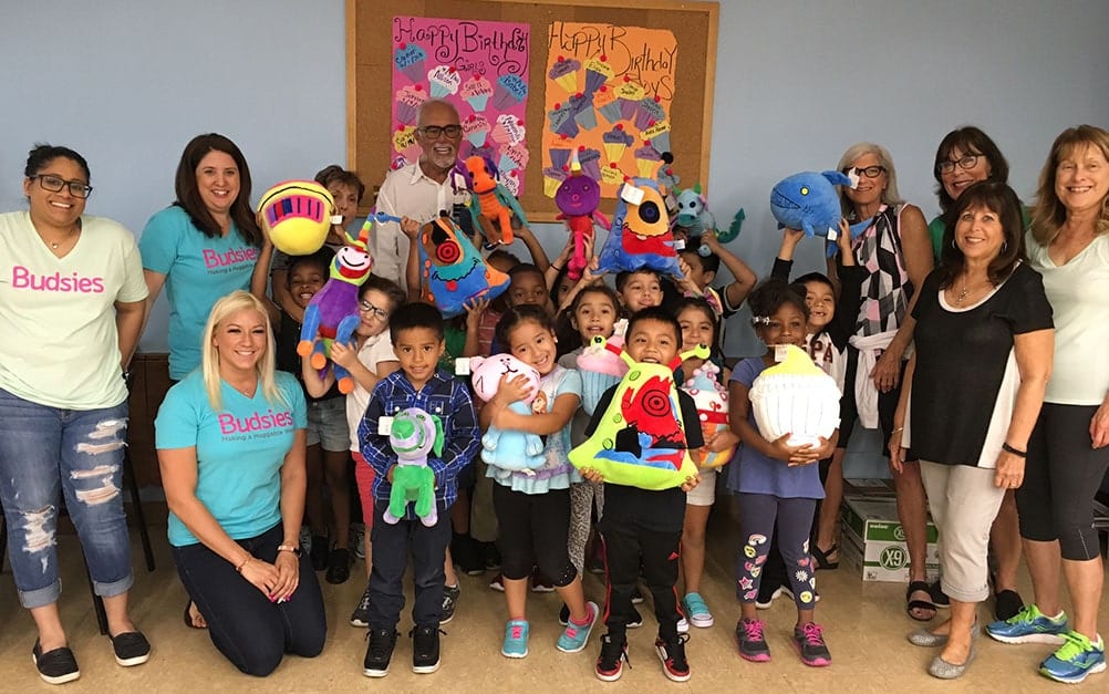 Group of children with Boca West members who support Boca West Children's Foundation