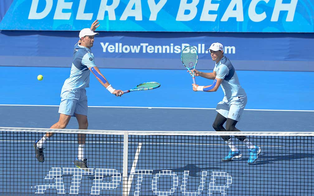 Two tennis players on the court at Delray Beach Tennis Center