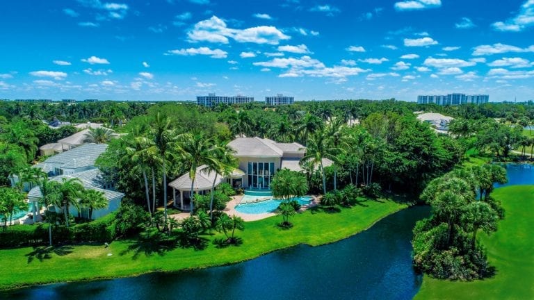 Single-family home on lake at Boca West