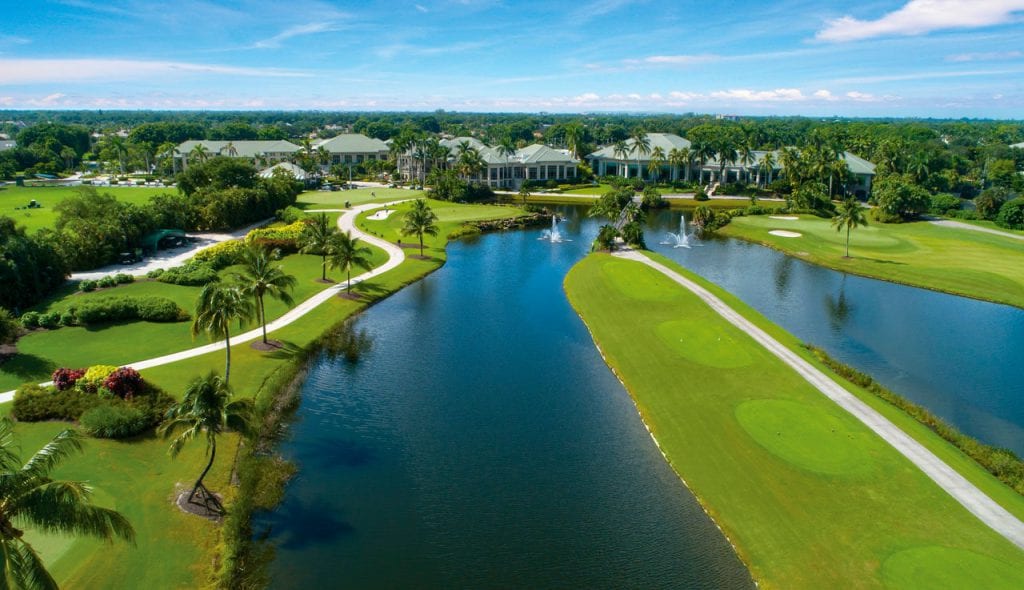 Expansive lake at Boca West Golf Course with homes in the background