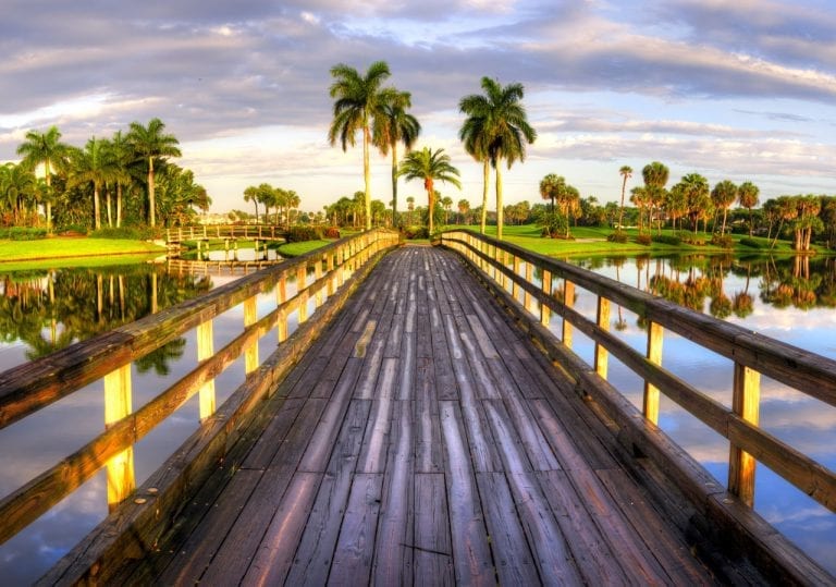 Bridge to first hole on Dye IV course at Boca West