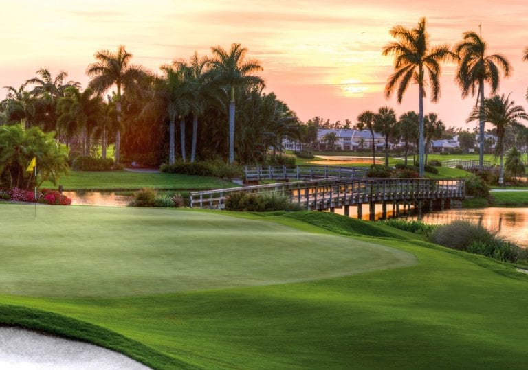 The green of Boca West&#039;s Dye IV 18th hole at sunrise