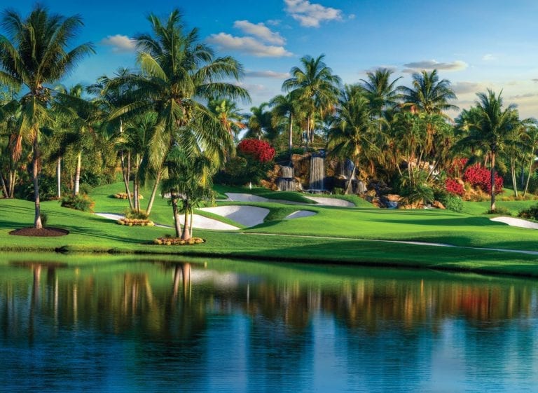 Group of bunkers and waterfall on Boca West&#039;s Fazio II golf course hole 18