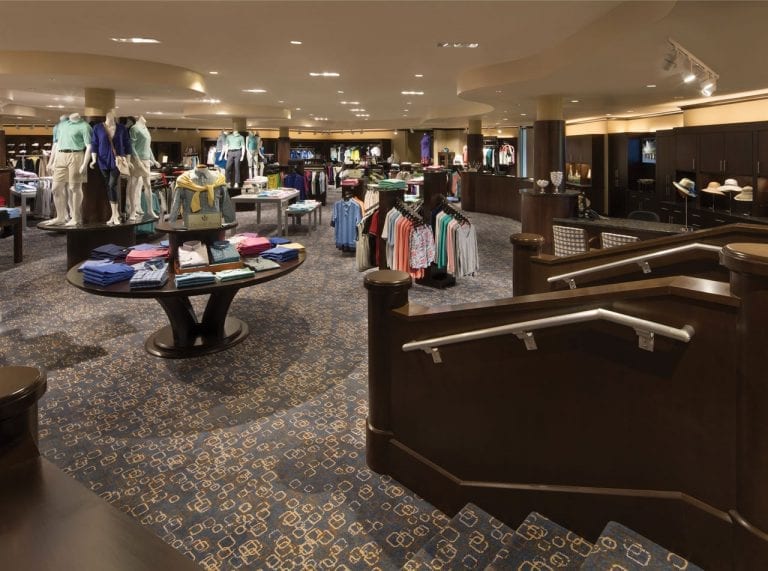 Boca West Pro Shop with golf clothing displayed on racks and tables