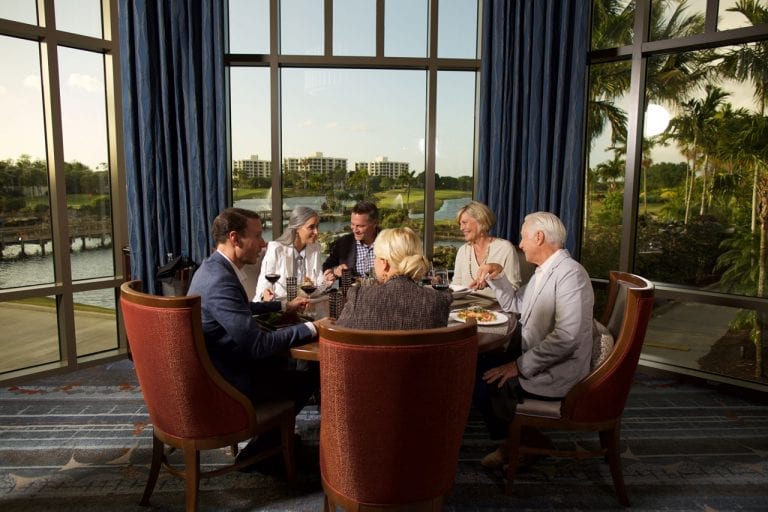 Table of couples dining at Boca West&#039;s Prime Cut