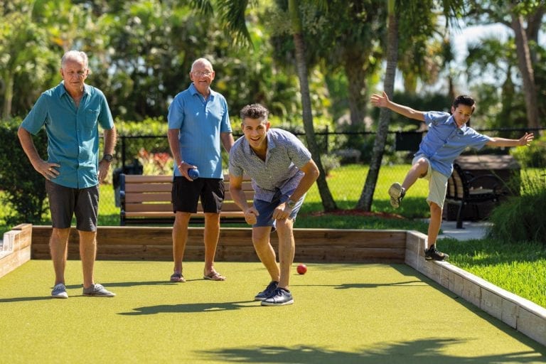 Men playing bocce at Boca West