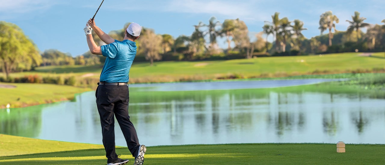 man playing on boca west golf course